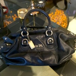 Genuine Coach handbag in black leather.